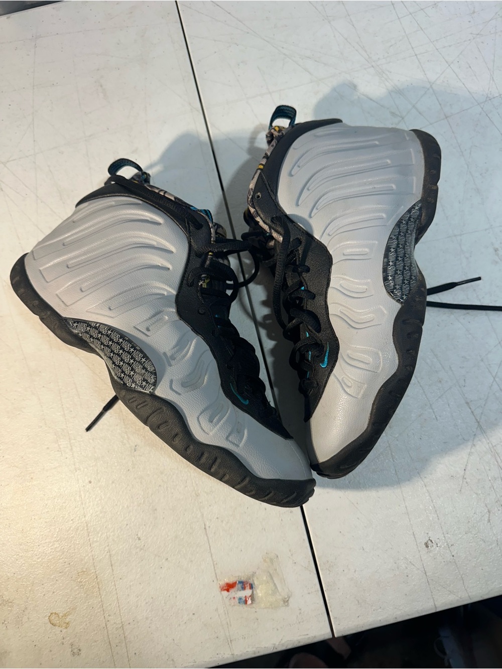 Nike Kids Silver and Black Foamposite Sneakers